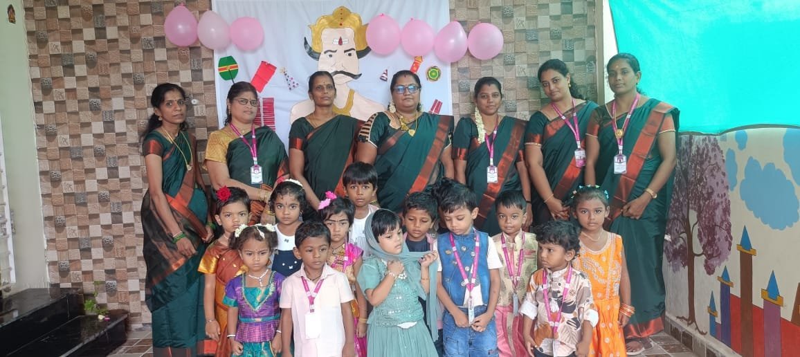 Drizzling Preschool students during a classroom celebration activity