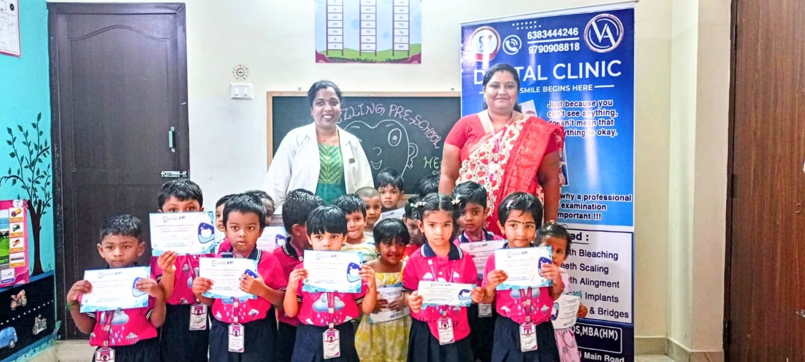 Drizzling Preschool students with dental clinic awareness visit certificates